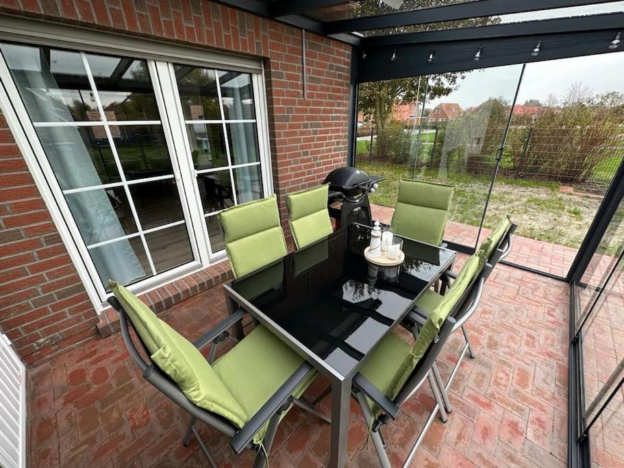 Haus Zuckersnuut Apartment Dornum Exterior photo